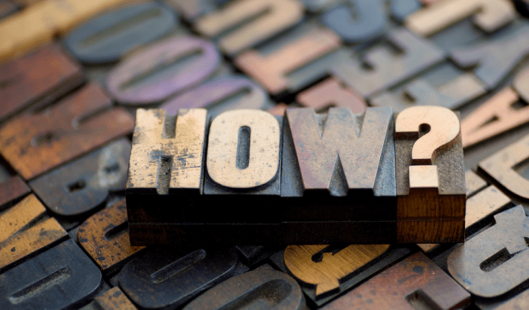 The word how shown on printing blocks.
